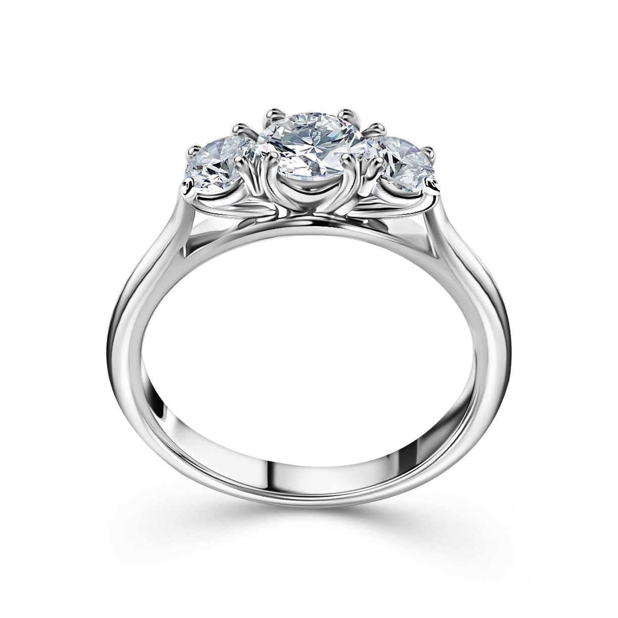 A white gold three-stone diamond ring with a round center stone and two smaller round side stones in a prong setting.