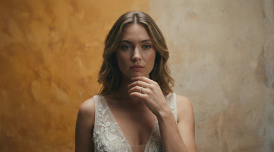 woman on her wedding day wearing a diamond set wedding band in platinum
